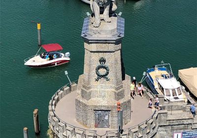 Lighthouse and Bavarian Lion Sculpture