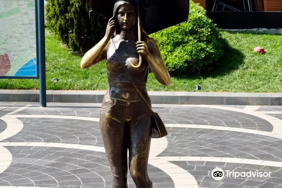 Sculpture Girl with Umbrella