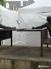 Statues Assises