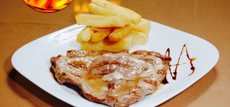 El Trinchero Carnes y Tacachos