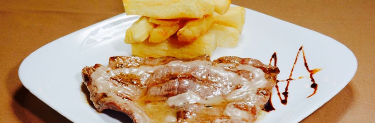 El Trinchero Carnes y Tacachos