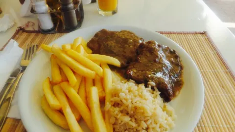 Woody's Cafe/Bar Restaurant in Thinali