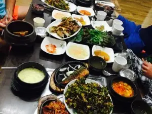 Countryside Leaf Wraps and Rice and Soybean Paste Stew With Snails