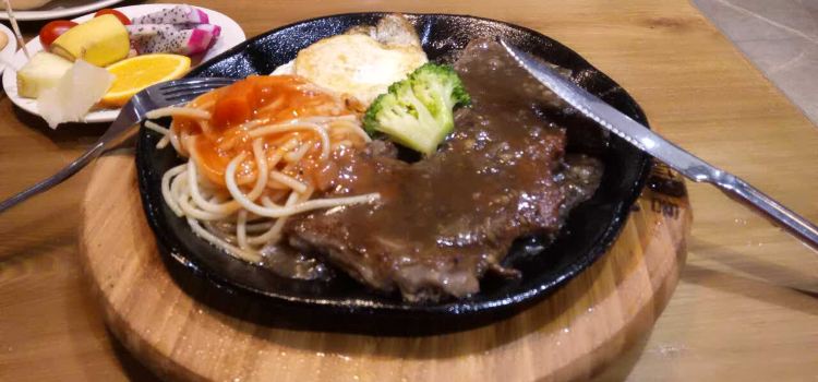 欢聚时尚客牛排(辉县店)