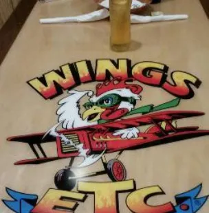 Wings Etc.