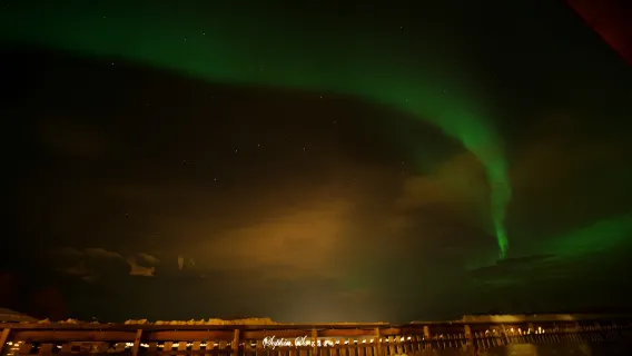 Chase the northern lights in Tromso, Norway with options including bus, reindeer, husky, snowmobile, or cruise.