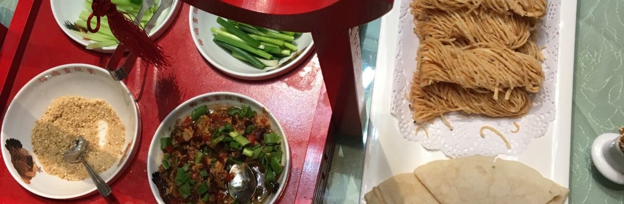 LONG SHAN BIN GUAN FEI NIU HAI XIAN CHENG