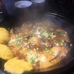 Stewed river fish in an iron pan User Photo