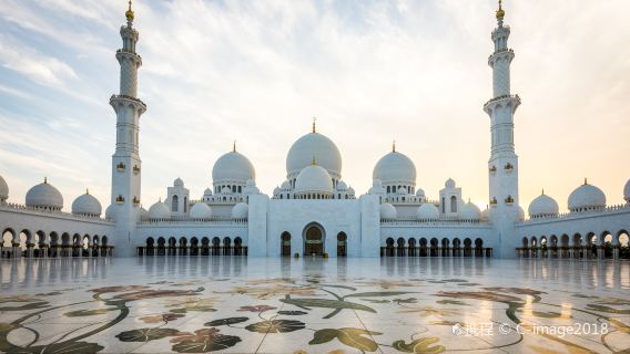 A tour from Dubai, UAE, including Abu Dhabi Mosque, Louvre Museum, Etihad Tower, and Presidential Palace.