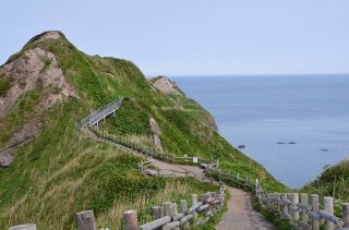 
It was a really nice day with a lovely strong sea breeze. We had driven for almost two hours from Niseko along the coast and arrived at around 10am. There were not many people on the walk. The panoramic coastal views were magnificent. The path although undulating, was not difficult. We could not complete the entire route because about 15 to 20 minutes later a guy came up and said the path was closed to all visitors because of strong winds. We then returned the way we came. The guy went on towards the tip of the cape (most likely to get the other visitors on the path to go back). Despite not being able to walk towards the tip of the cape, we felt lucky to have seen some of the views along the walk. Certainly it is the place that you cannot miss it if you drive a long way from Sapporo. The scenic is breath taking.

#givethanks 
#givethanks