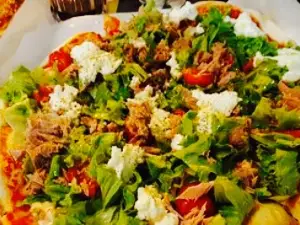 Pizza Al Volo Di Tirelli