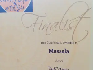Razas Pizza and Curry House