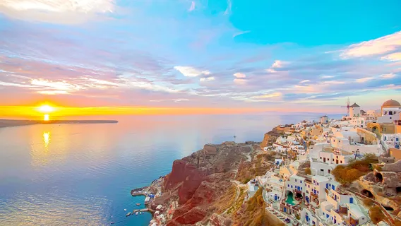 Sailing boat in the Santorini caldera with Aegean Sea views