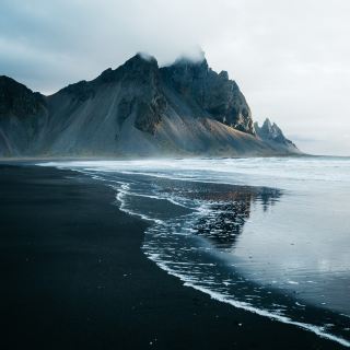 The beach at Stokksnes peninsula in Iceland. You will not find white sand and palms here, but its truly one of the most beautiful beaches I have ever been to.