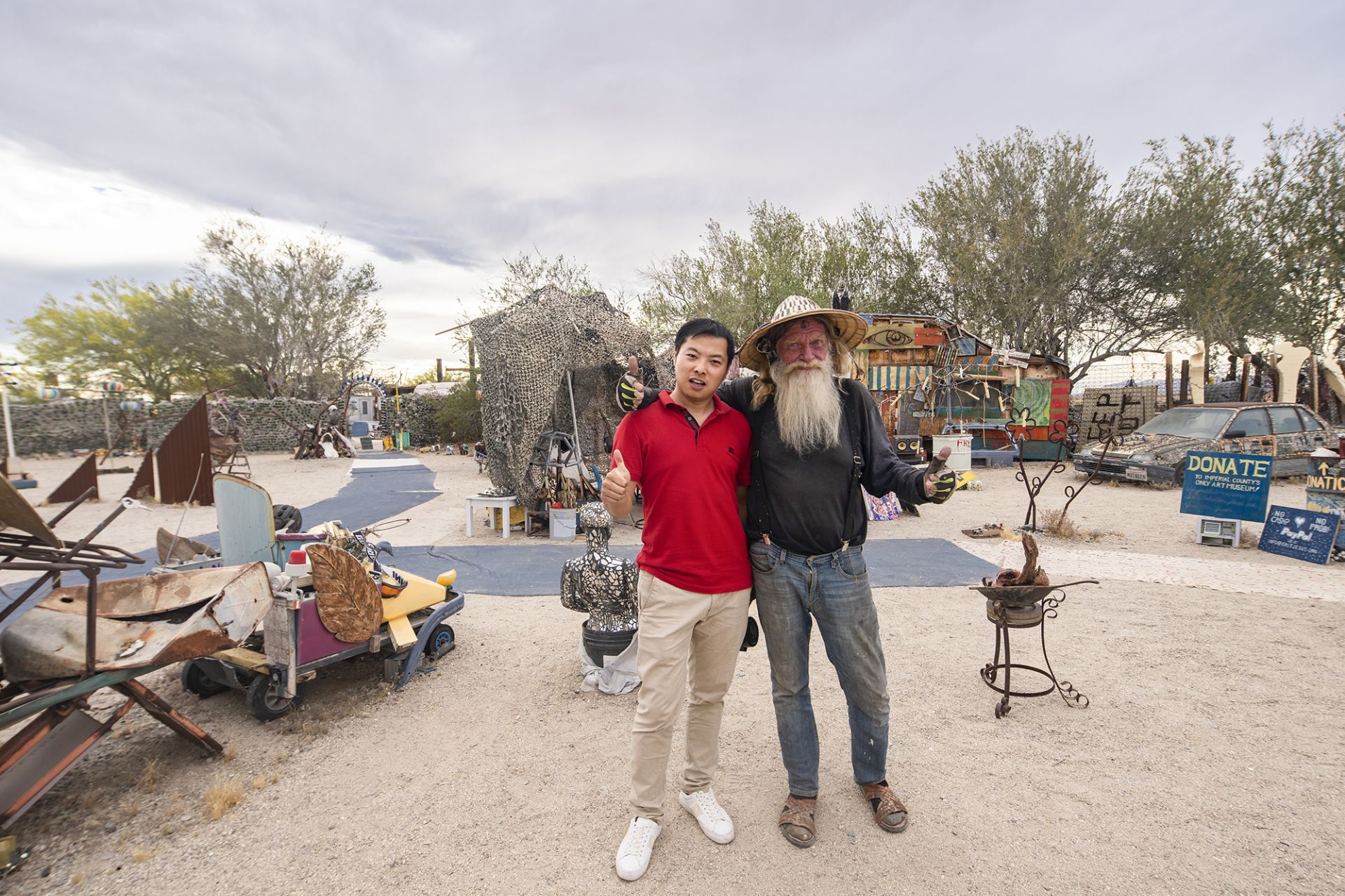 I have written about Salvation Mountain in the middle of the Colorado Desert. I don't know that there is another art treasure one miles away. It is East Jesus. 

 This is a park full of art sculptures, built by a technician a dozen years ago. The artwork in the park is completely hand-made and very interesting, such as elephants made from used car parts, skewed wooden houses, and old-fashioned motorhomes with decorative items. 

 The owner who was lucky enough to meet here, an old man with a white beard, was really a little Santa Claus. He told me the two rules here.
