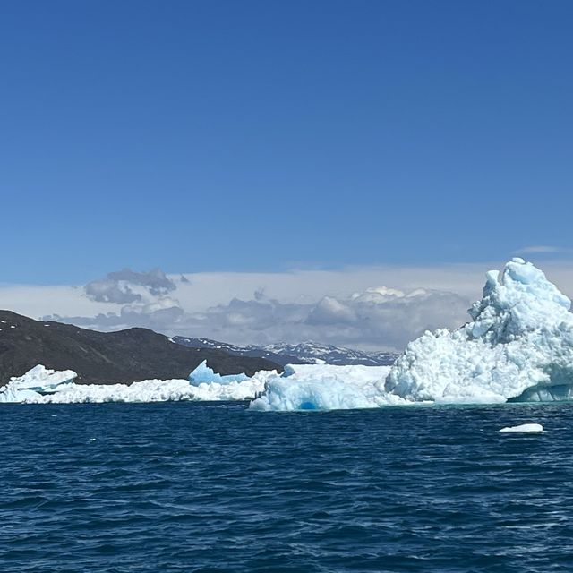 Beautiful Blue Icebergs in open sea!