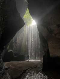 Spectacular cave waterfall in Bali