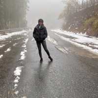 Hiking in snowy Moganshan Mountains.