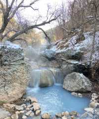 Soak in the ancient hot springs in the wilderness of Utah.