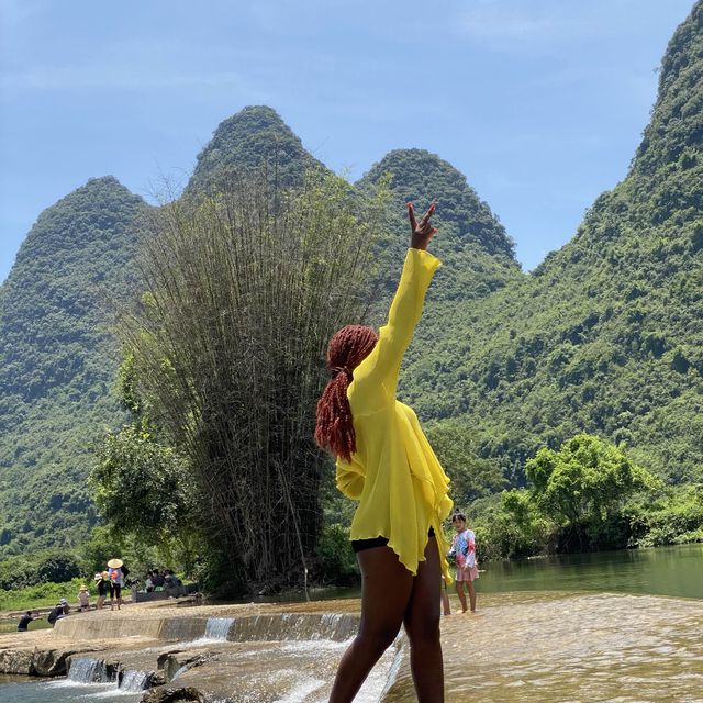 Bamboo boat rafting along Yulong river 