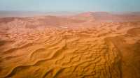 Don't miss the sunrise in the Badain Jaran Desert.