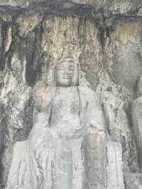 Headless Buddhas at Longmen Grottoes