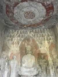 Headless Buddhas at Longmen Grottoes