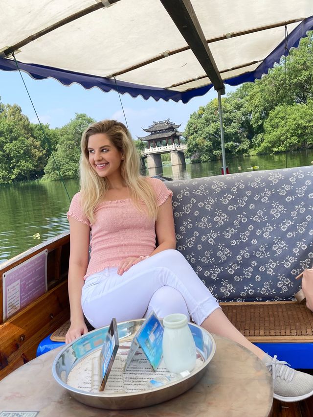 Serene Boat Ride In Hangzhou 
