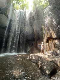 Spectacular cave waterfall in Bali