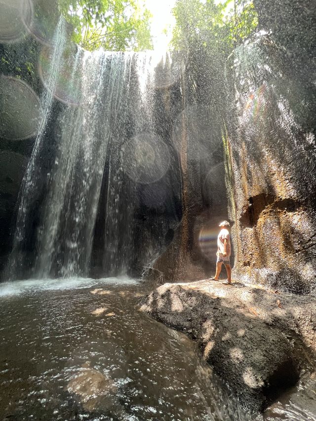 Spectacular cave waterfall in Bali