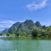 Bamboo boat rafting along Yulong river 