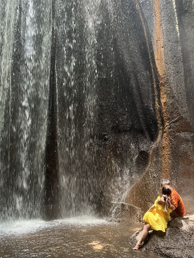 Spectacular cave waterfall in Bali