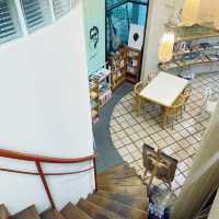Library in Cafe or Cafe in Library?