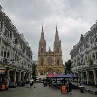 A cathedral in the middle of a modern city