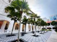 Lush palm trees and manicured gardens
