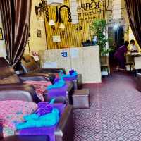 Relaxing at spa and massage shop in town