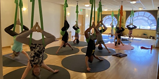 Women's aerial yoga class | PranaTonic Yoga + Wellness