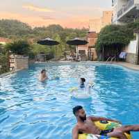 Outdoor pool and Cafe at Bamboo Leaf Hotel