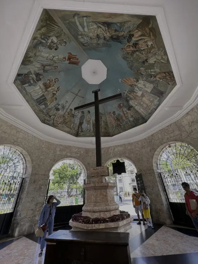 A stone kiosk, Magellan's Cross Pavilion