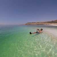 Floating in the dead sea, Jordan.