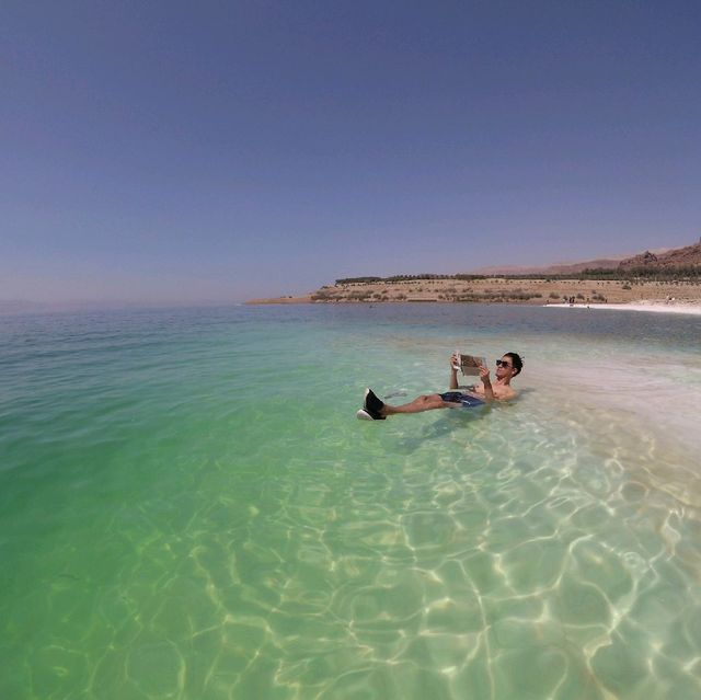 Floating in the dead sea, Jordan.