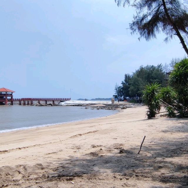 Beach nestled in a fishing village 