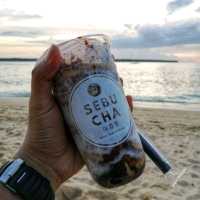Milktea on the beach during sunset