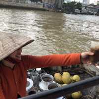 Lively floating market and try local produce