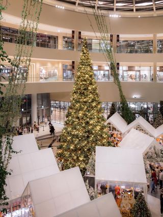 A Christmas village covered in pure white snow