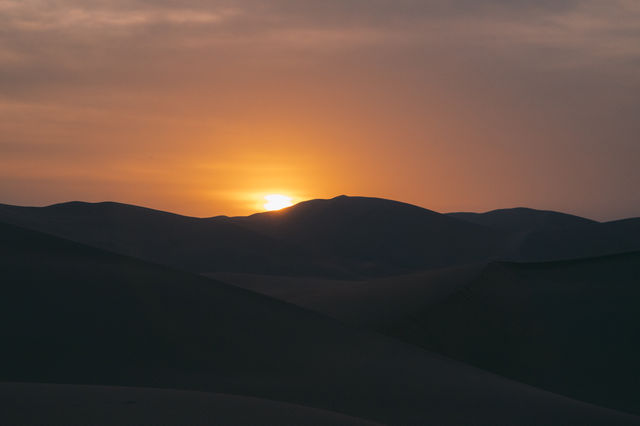 Don't miss the sunrise in the Badain Jaran Desert.