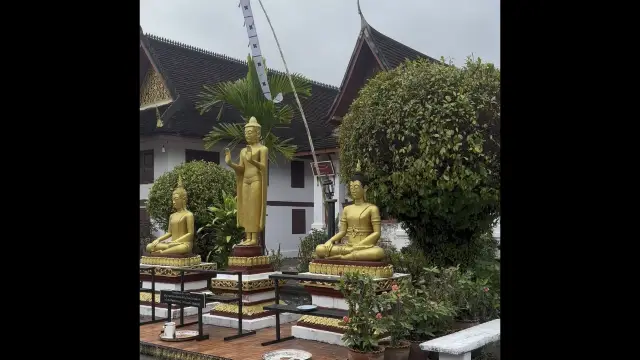 Buddha statues and Buddhist school at Wat Mai