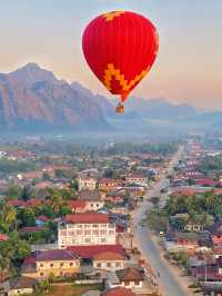 Laos Travel Guide | Watch the sunrise from the world's cheapest hot air balloon ride!