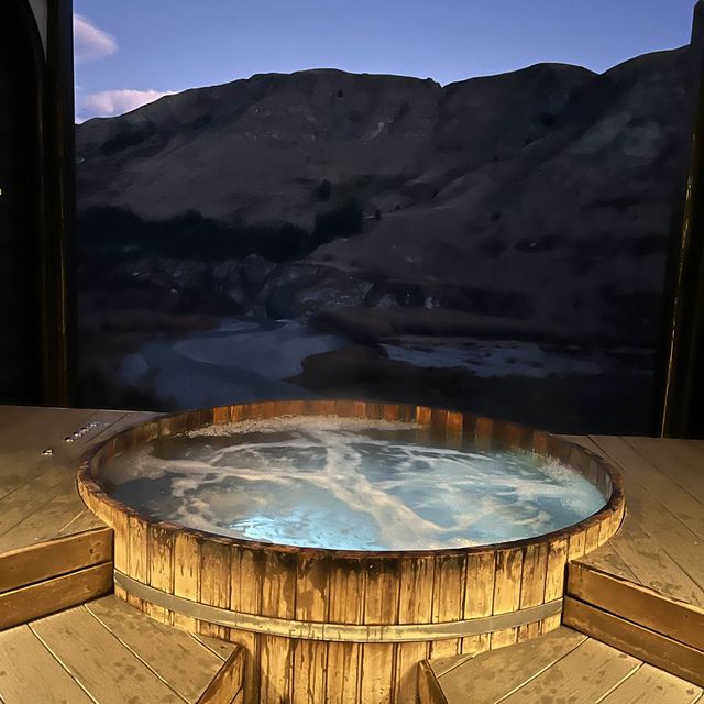 Relax in a onsen with an amazing view 