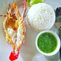 สีดำนมสด คาเฟ่และร้านอาหาร ริมแม่น้ำปราจีน